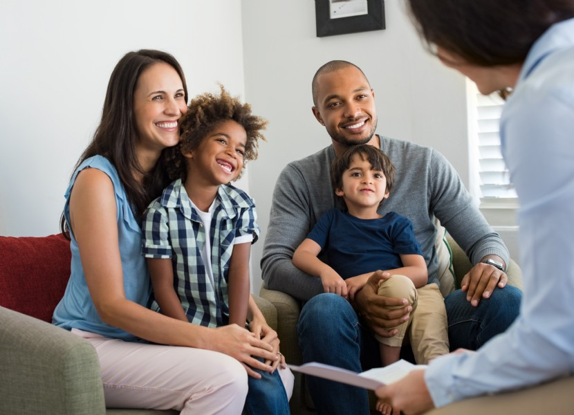 Social worker having a consultation with a family