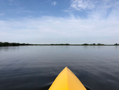 yellow kayak on lake
