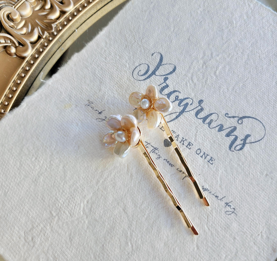 Thumbnail: Keshi pearl flower hair pins on stone surface with gold-plated bobby pin base
