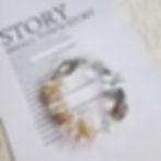 Keshi pearl and crystal statement bracelet styled on printed paper
