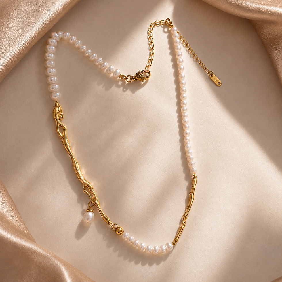 Virga freshwater pearl choker with gold branch detail, handmade pearl necklace flat lay.
