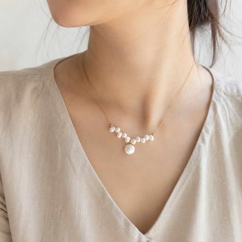 Coin pearl necklace with a single 11mm freshwater pearl pendant and delicate rice pearl chain