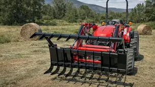 ANBO tractor grapple attachment built with AR400F steel, heavy-duty construction, greaseable pivots, and USA-made materials for long-term use.