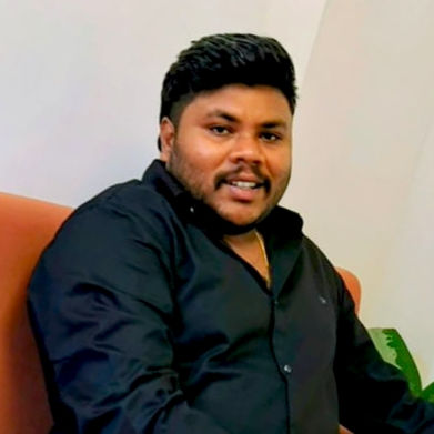 Man with mustache in black shirt smiling