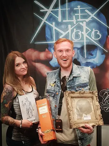 Alex Moro with client and awards at Deauville Tattoo Convention France 2018