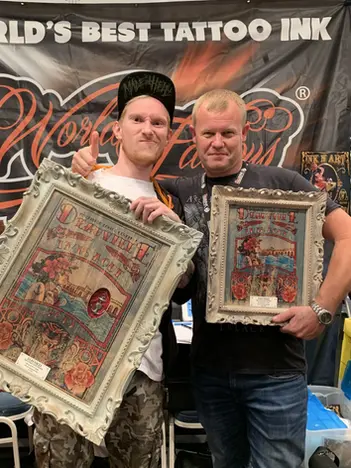 Alex Moro with artist at World Famous Ink booth Deauville Tattoo Convention 2019