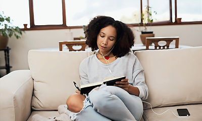 woman journaling on the couch_edited_edi