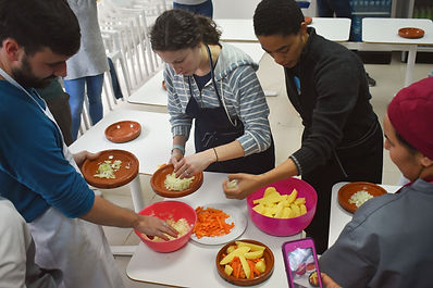Students learning to cook Moroccan food