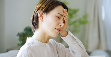 めまいがする女性