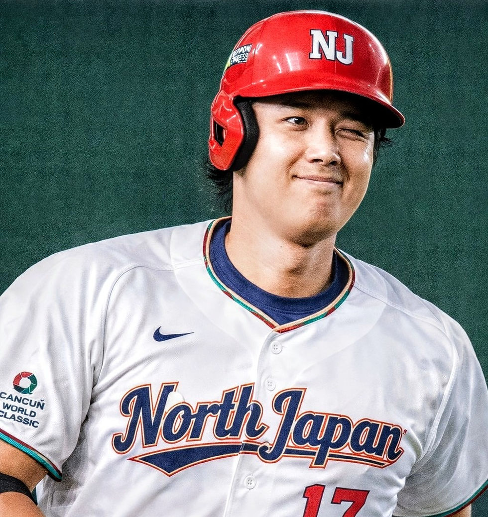 Baseball player Tony Ohtani winks, wearing a red North Japan Samurai helmet labeled NJ and white North Japan Samurai jersey with North Japan logo. Green background, Cancun World Classic patch.