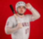 Los Angeles Angels baseball player Mike Trout in bubble wrap uniform and bicycle helmet holds a bat against a red background, wearing Angels 27 jersey.