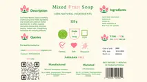 Packaging design for Mixed Fruit Soap displaying natural ingredients, product benefits, weight, TFM value, manufacturing details, QR code, barcode, and contact information for the manufacturer and marketer.