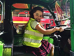 Child in driving seat of bus
