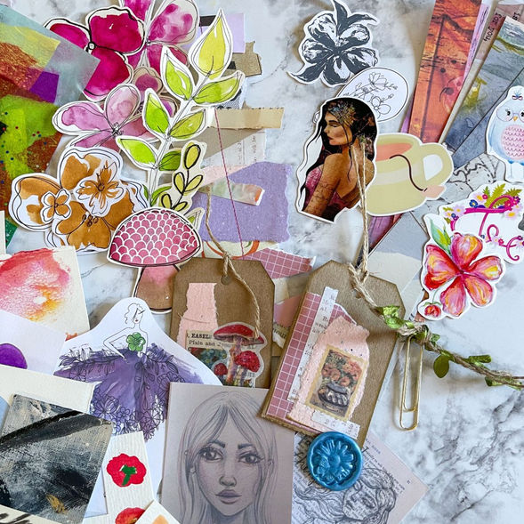Art ephemera pieces scattered to show example of what is included in pack 