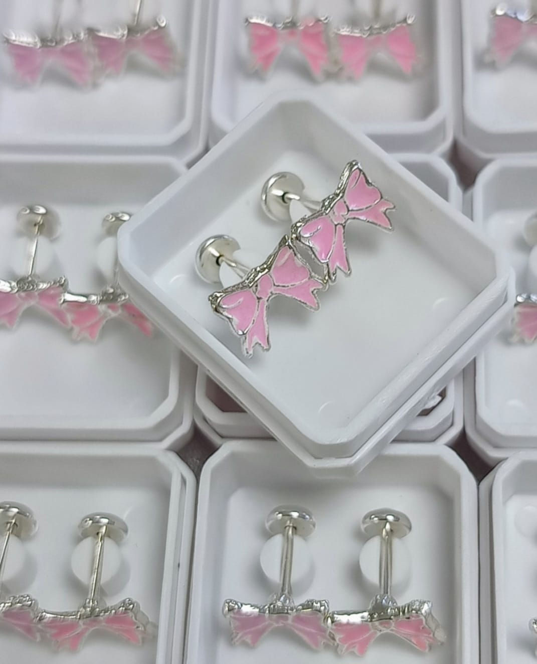 Abridores moño rosa Plata 925