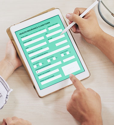 agent-filling-form-health-insurance-with-patient.jpg