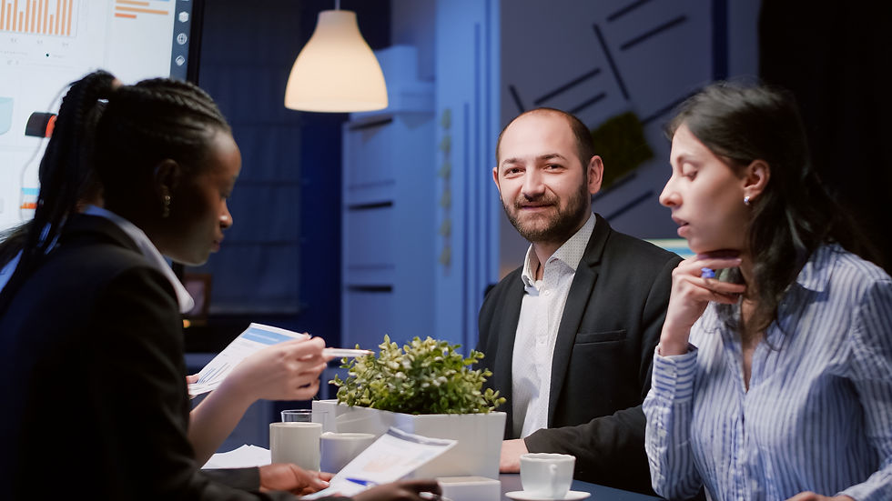 portrait-smiling-manager-man-looking-front-working-company-strategy-meeting-office-room-la