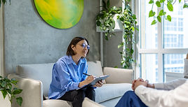 psycho-session-psychologist-having-sessiona-with-couple-making-notes.jpg