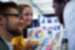 group-graphic-designers-choosing-color-from-color-chart.jpg