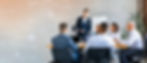 busy-multiethnic-young-people-managers-listen-boss-talking-about-work-watching-presentatio