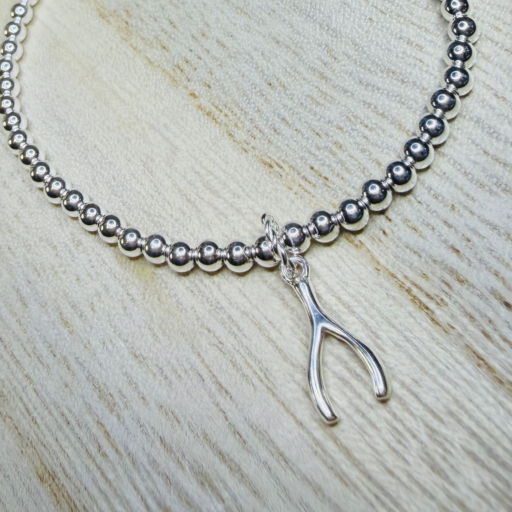 Wishbone Beaded Charm Bracelet