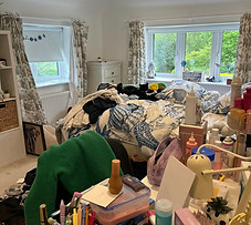 Bedroom before being organised and decluttered by Declutering Crew