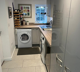 Small kitchen area clear and organised.