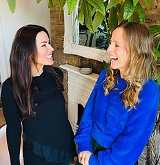 Alix and Georgina sharing a joke