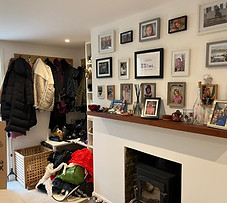 Cluttered Hallway used as a dumping ground.