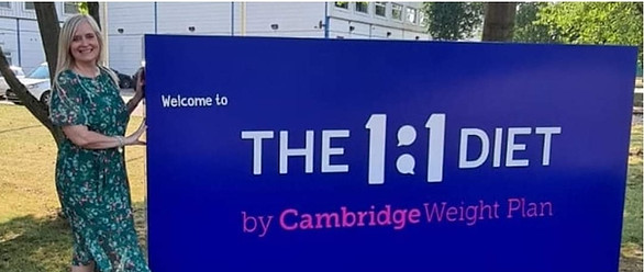 Nicki Standing outside The 1:1 Diet by Cambridge Weight Plan Headquarters in Corby