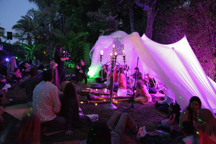 Large outdoor event under immersive lighting
