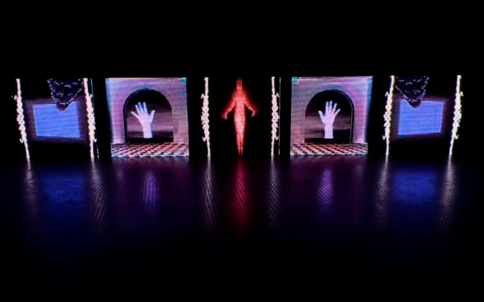 Symmetrical audiovisual installation with digital human figure and abstract projections across multiple screens