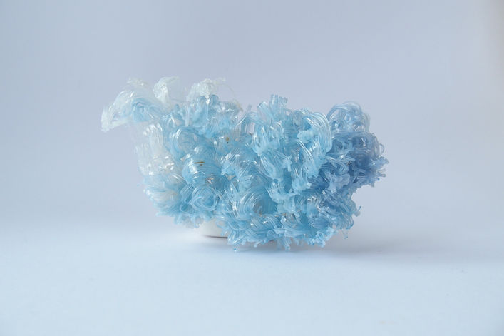 Breaker, Brooch by Mizuki Tochigi, representing the powerful energy of ocean wave, made from recycled plastic bottle and recycled silver.