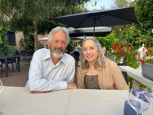 Couple sitting at a restaurant, married couple, business owners, christian retreat