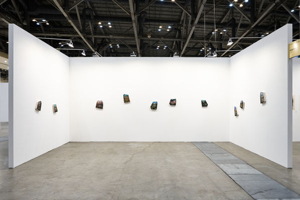 Selected works and installation from Michael Rikio Ming Hee Ho’s exhibition. Text-based conceptual paintings on shaped canvas.