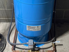 Residential well pressure tank system showing common setup related to waterlogged tank issues in Bellbrook Ohio