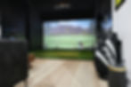 Golf simulator bay set up for professional indoor golf