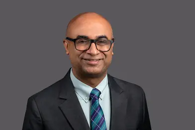 Headshot of a CEO with a clean backdrop shot by a professional photographer in Gurgaon, Delhi NCR.
