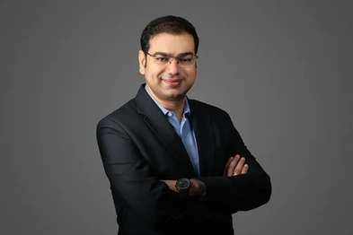 Corporate headshot of a advocate, lawyer with a clean backdrop shot by a professional photographer in Gurgaon, Delhi NCR.