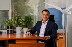 Lifestyle portrait of a CEO working in his indoor office environment for personal brand building, magazine feature and media coverage.