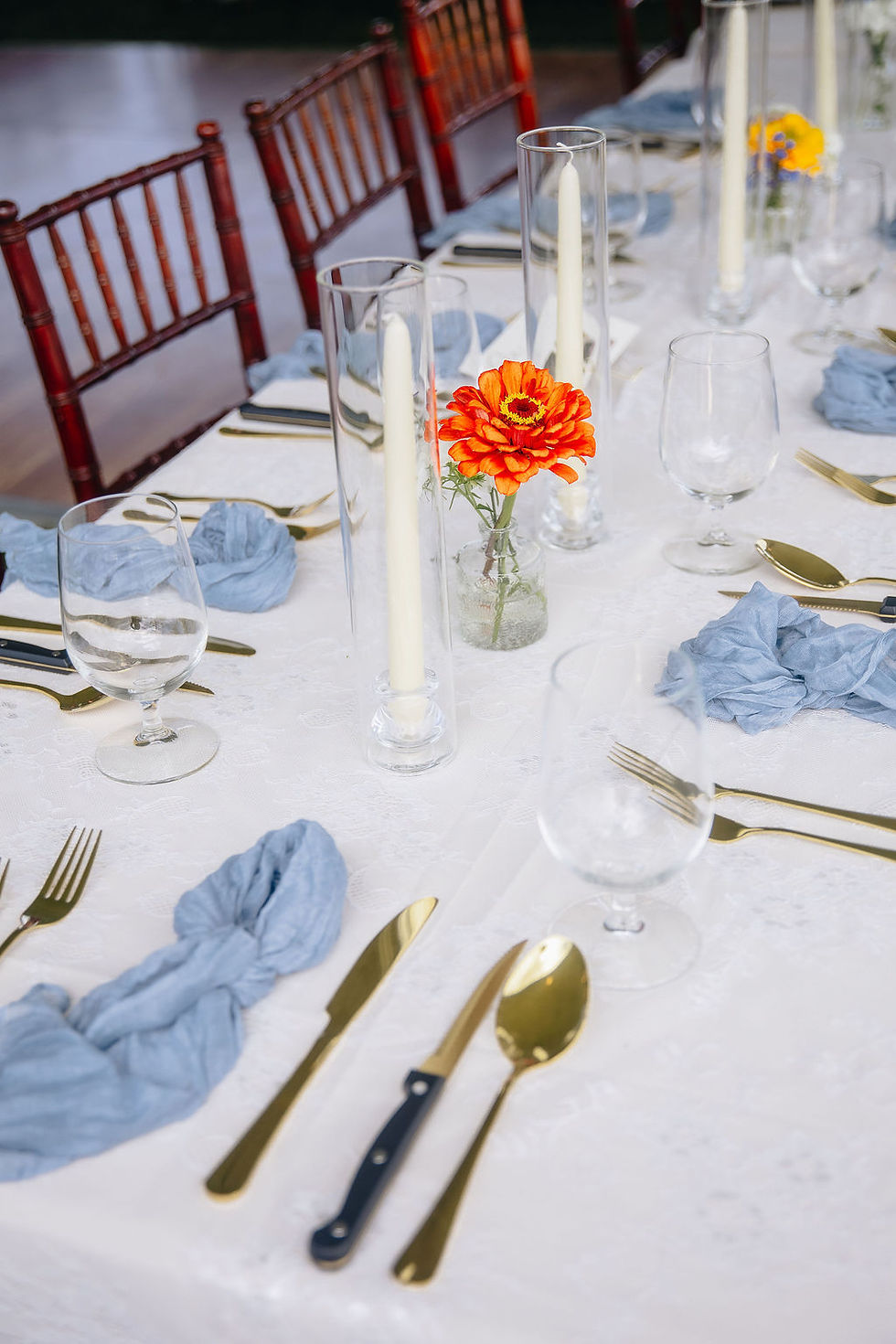 Budvase on table at Montana reception utilizing farm fresh flowers from Two Kays Flower Farm