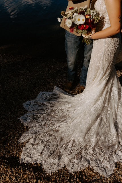 August elopement couple at Bowman Lake in Glacier Park