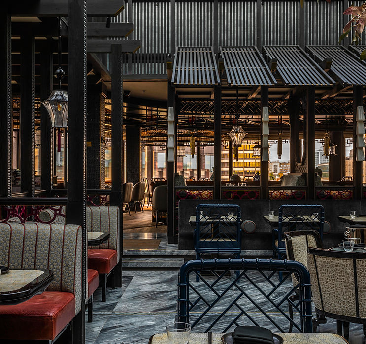 Light-led architectural restaurant photography of Tattu London, showcasing immersive interior design by Joyce Wang Studio. Captured by Edmon Leong.