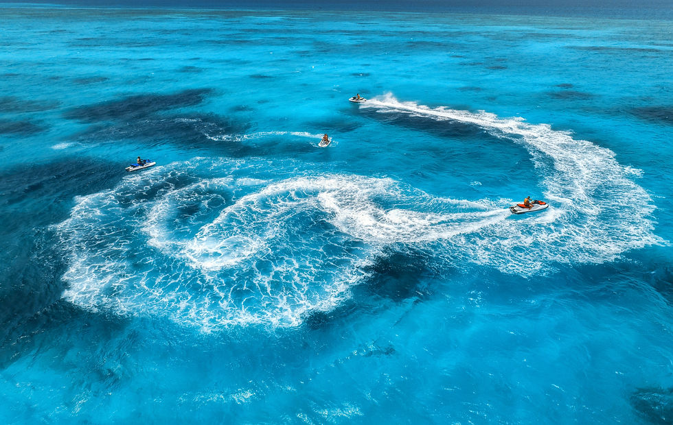 aerial-view-of-floating-water-scooter-in-blue-wate-2026-01-06-08-55-17-utc.jpg