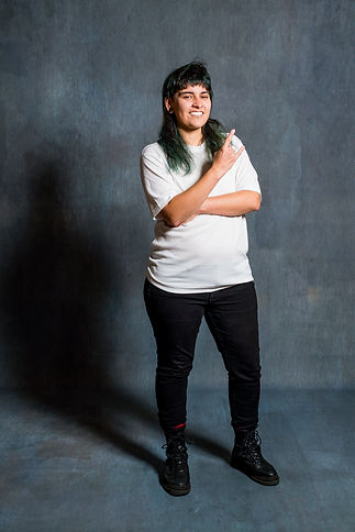 allegra rock on standing smile headshot.jpeg