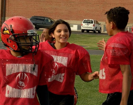 Raytown middle school girl gets tough on the football field
