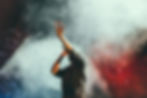 Concert crowd with hands raised, representing the latest hip-hop news roundup