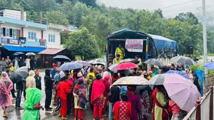 Flood-affected families waiting at the distribution point