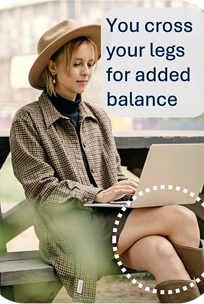 User crossing legs to support a laptop