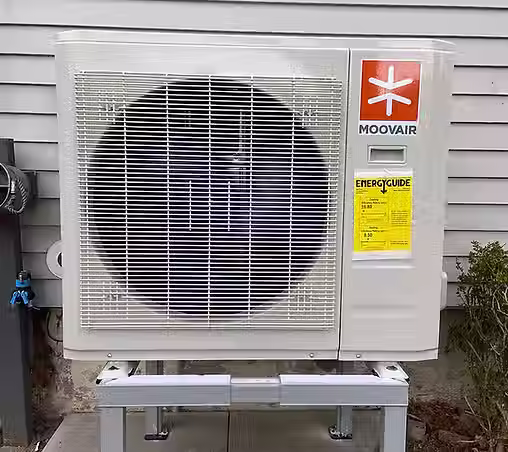 Moovair central air conditioning system installed beside Hamilton hom